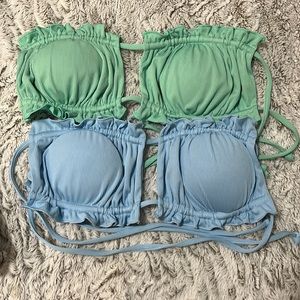 2 bathing suits tops, blue and green. They are medium, fits a small too
